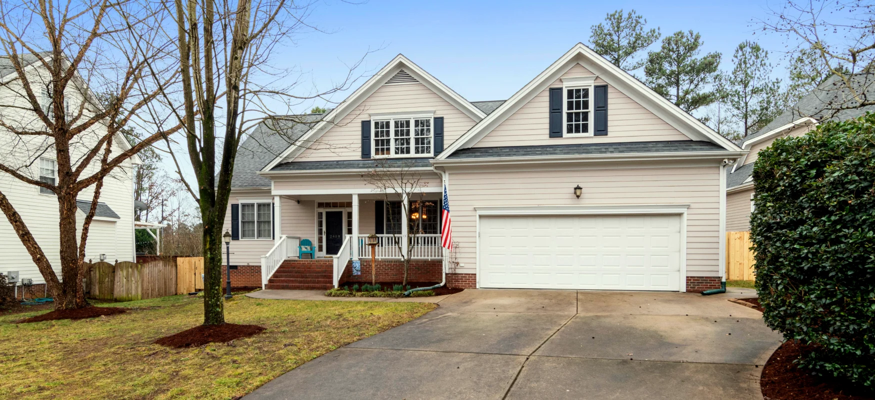 Beige House With Flag Photo